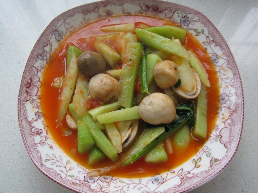 芥蓝草菇西红柿的做法