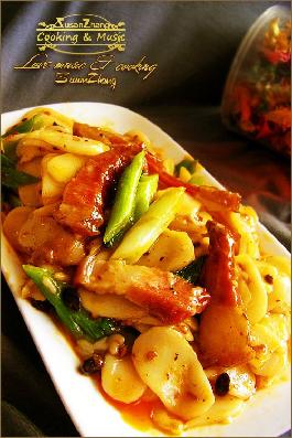 腊肉炒年糕的做法