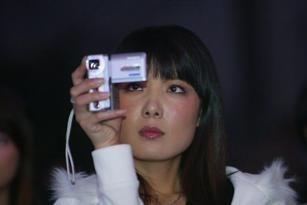 �̵��׶ذ���֮��Ů�˶�Ա(��ͼ)